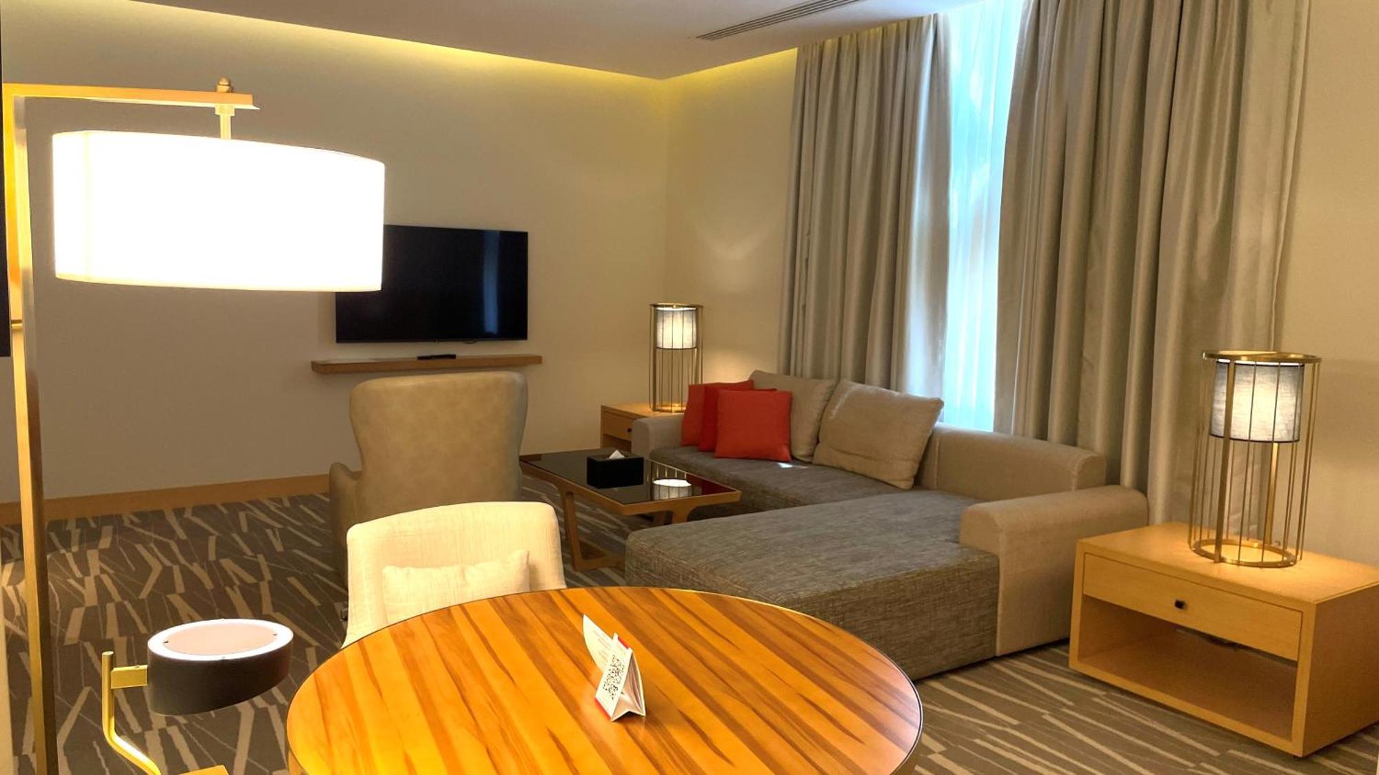 Ramada Hotel & Suites By Wyndham Al Qassim Al Bukayriah Esterno foto Living room of a suite